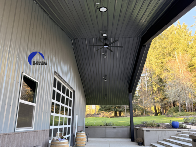 Metal installed under over hang on steel building