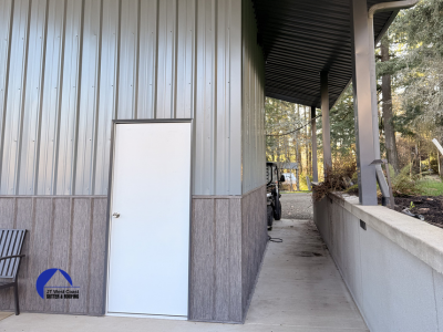 gray and barn metal siding on steel building